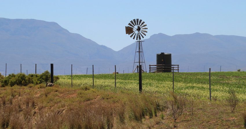 Scene in Southern South Africa with old-style windmill