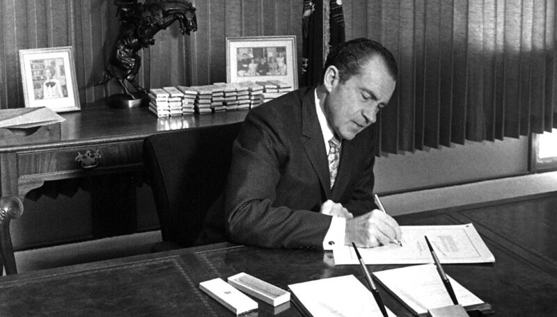 Nixon signing the National Environmental Policy Act